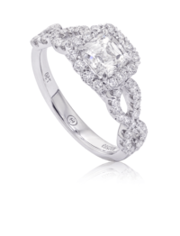 Cushion cut diamond engagement ring with halo and twist shank design